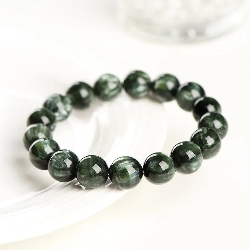 Natural green Grade 7A Green Dragon Crystal bracelet with 8-9mm round beads and Ruyi elements