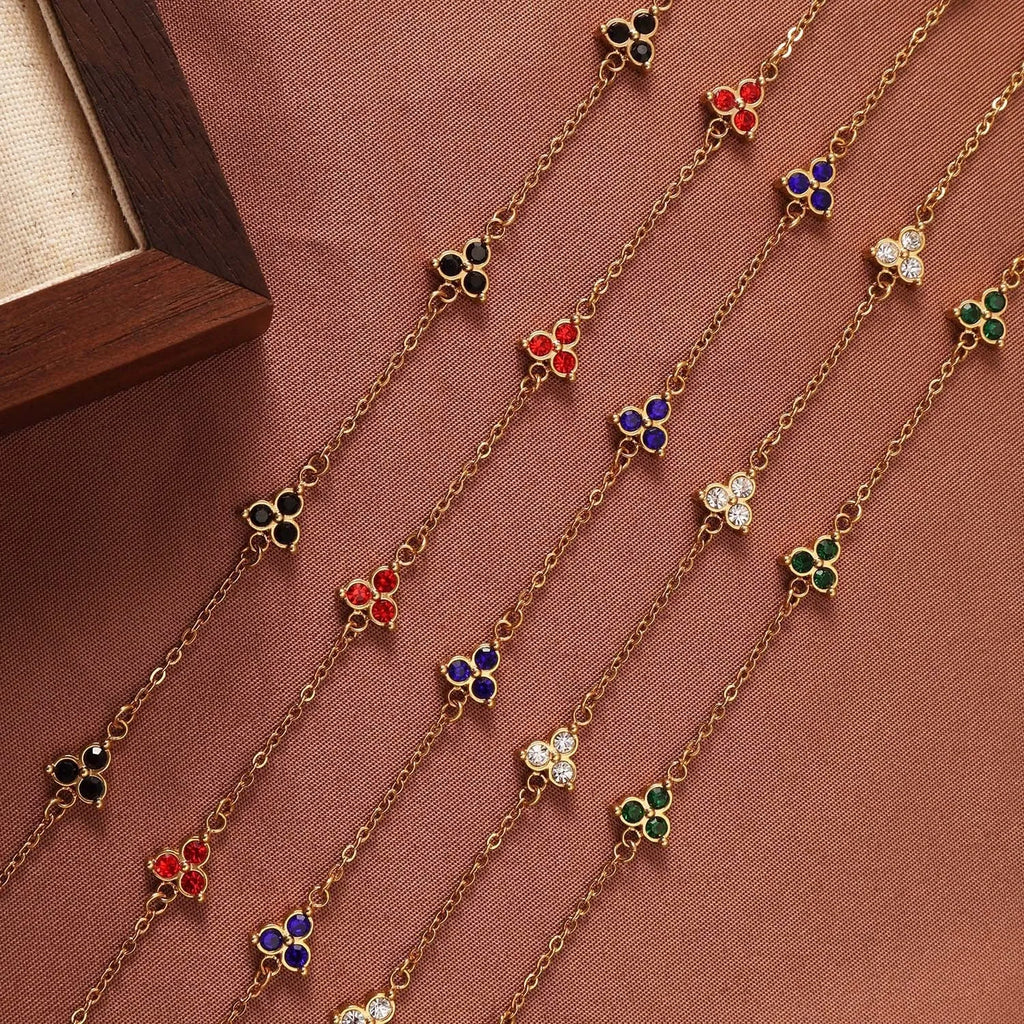 Women's stainless steel geometric triangle bracelet with three diamond stones and adjustable chain