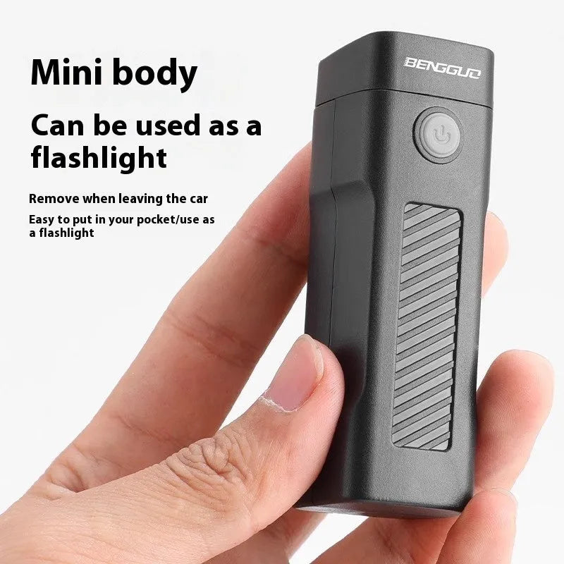 USB rechargeable bicycle headlight with quick-release strap bracket on handlebars.