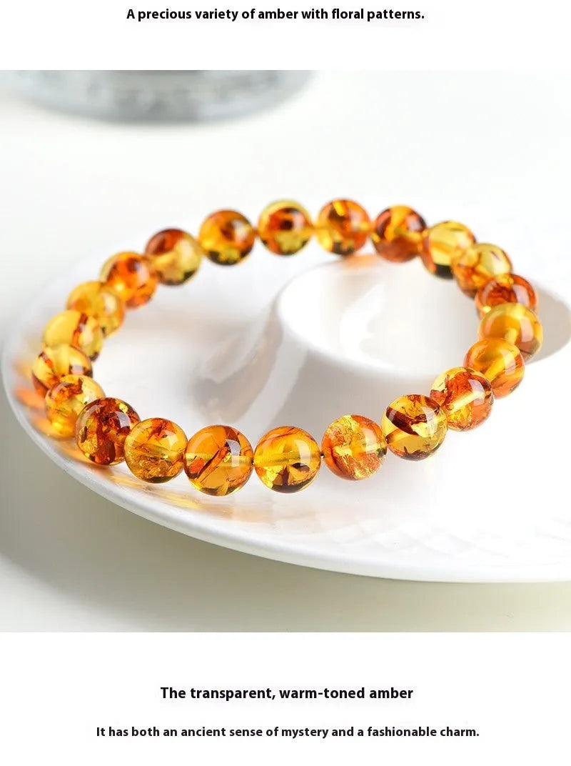 Natural yellow piebald amber water purification bracelet with geometric beads