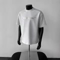 Men's loose fit cotton short sleeve shirt in light grey with letter pattern design