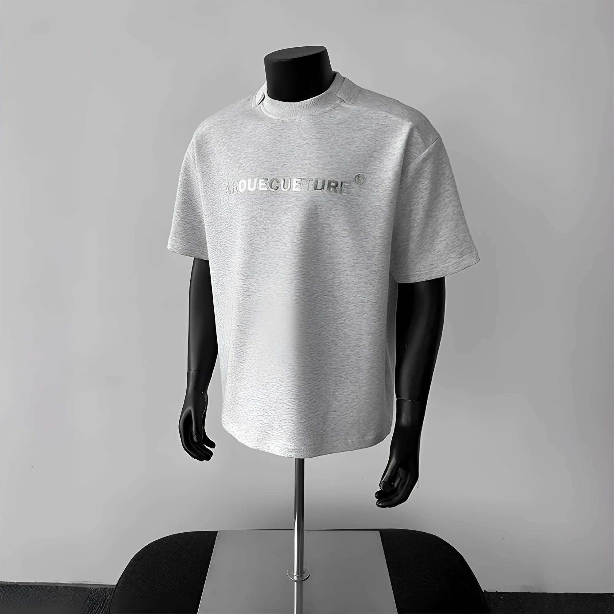Men's loose fit cotton short sleeve shirt in light grey with letter pattern design