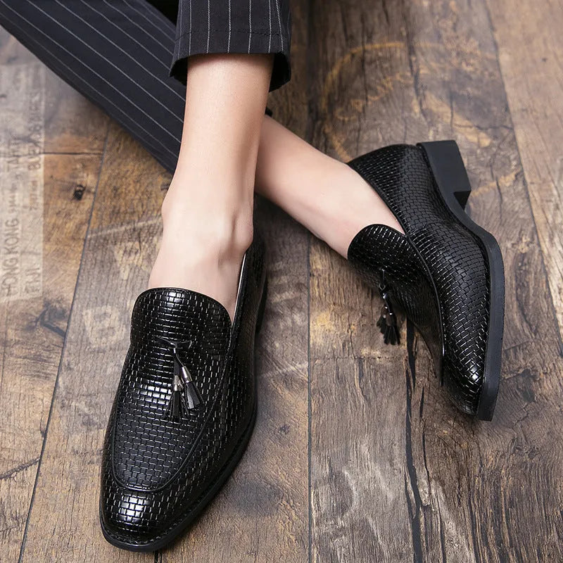 Men's black pointed slip on shoes with tassel detail on artificial PU upper