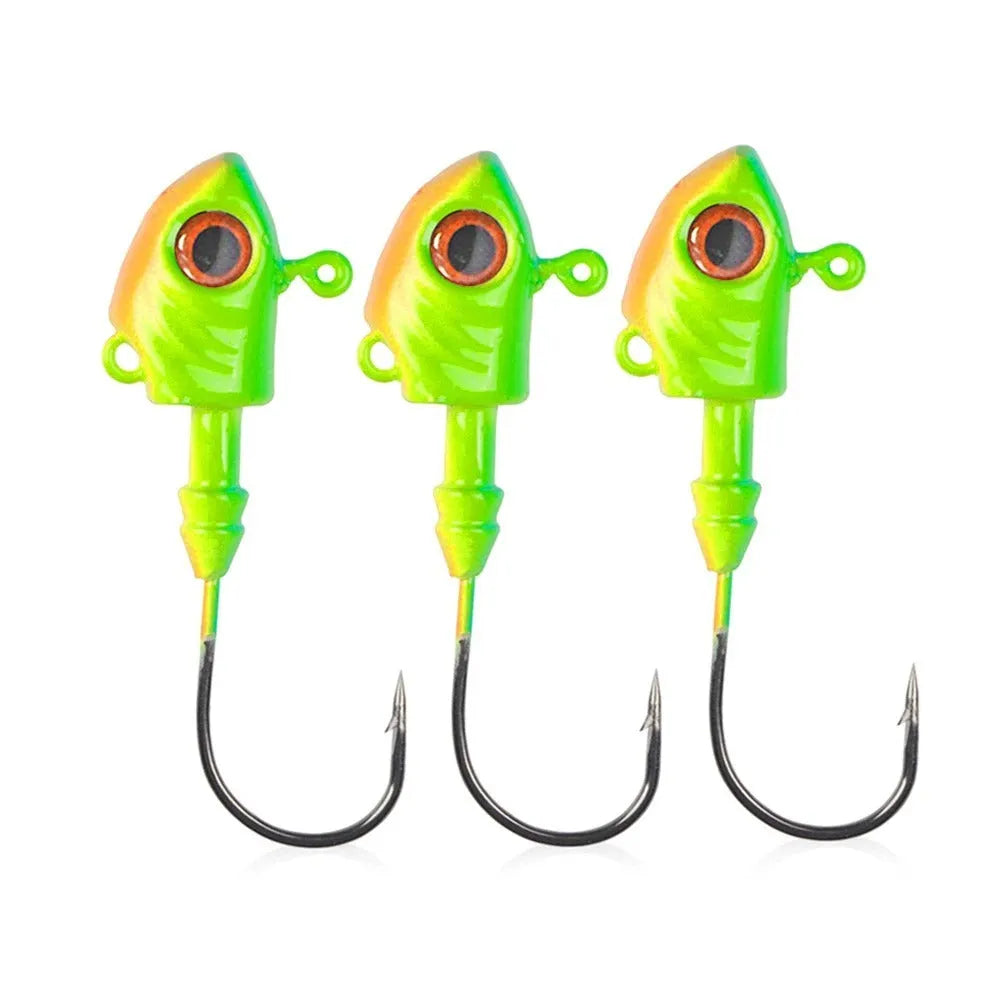 Simulation Yayu shaped lead head fishing jig hooks in blue, silver, and yellow colours showing fish-shaped design.