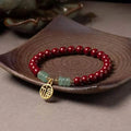 Handmade gold cinnabar wave bracelet with copper beads in national style