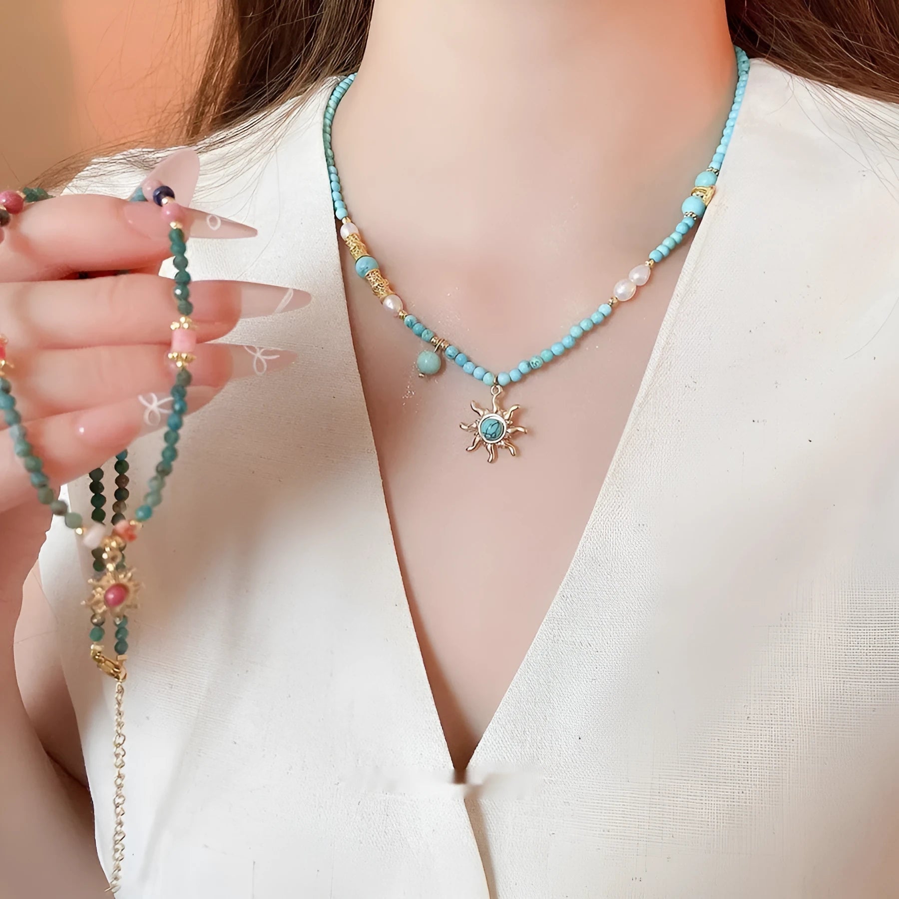 Freshwater pearl necklace with stone sun pendant on clavicle chain