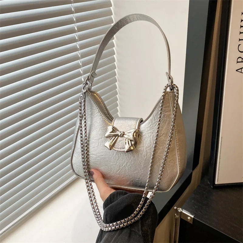 PU dumpling underarm bag with one-shoulder strap, sandwich pocket, sewing thread detail, shown in black