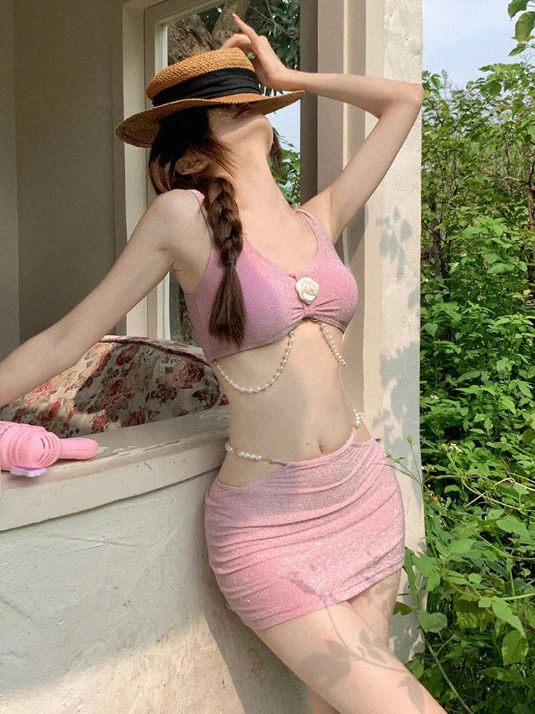 Women's pink or black polyester three-piece bikini swimsuit with briefs style for swimming and hot spring use