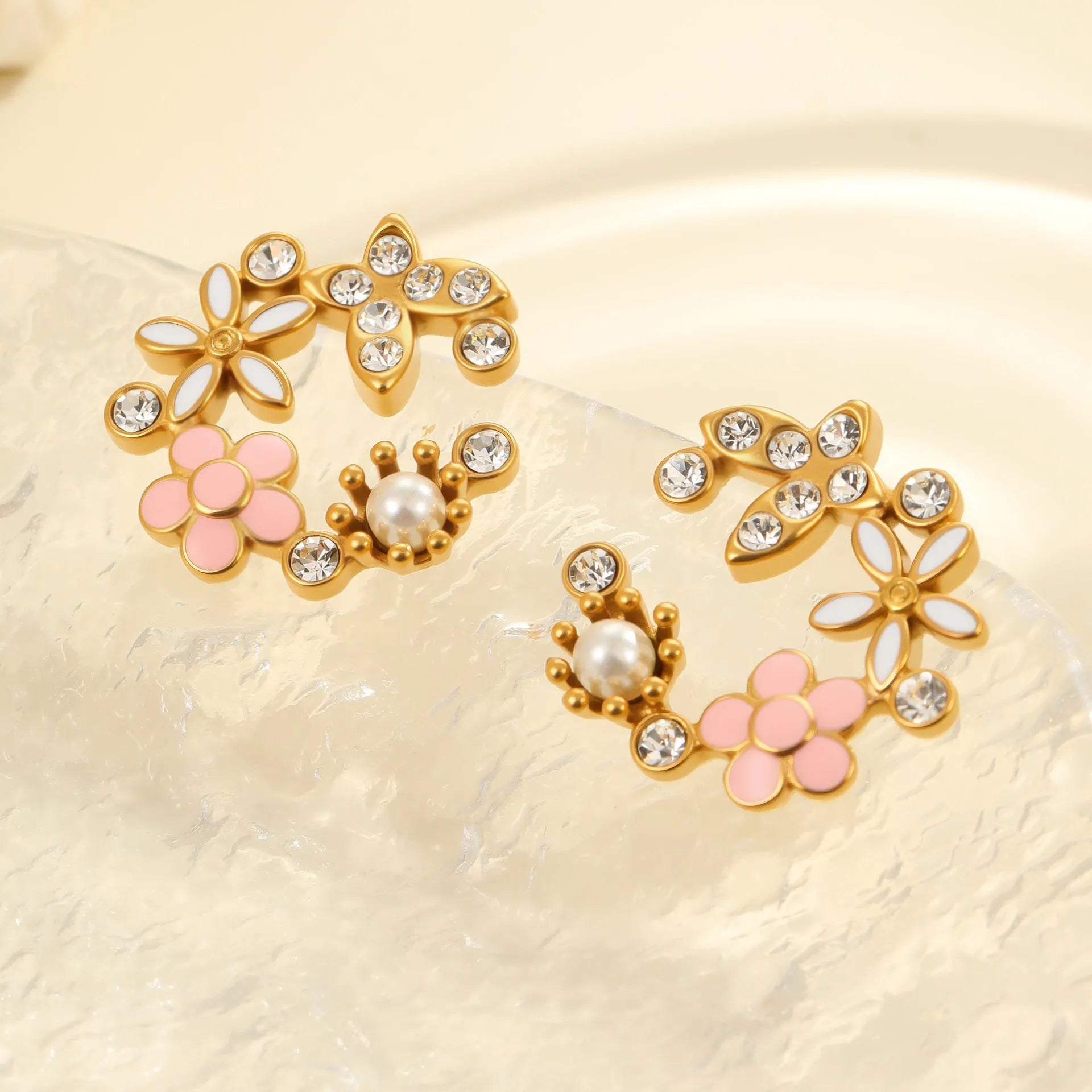 Flower stud earrings with petal design and 18K gold colour electroplating