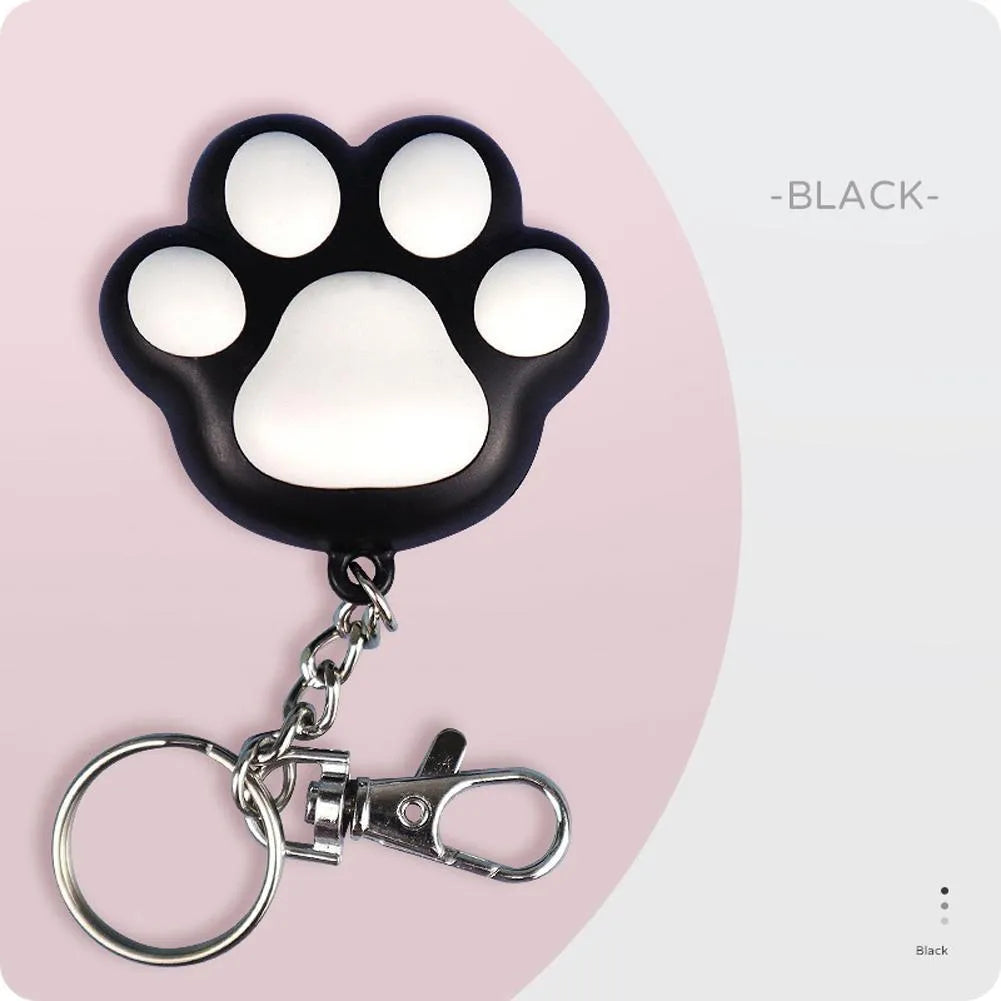 Compact black infrared cat teaser toy with USB charging port and keychain attachment