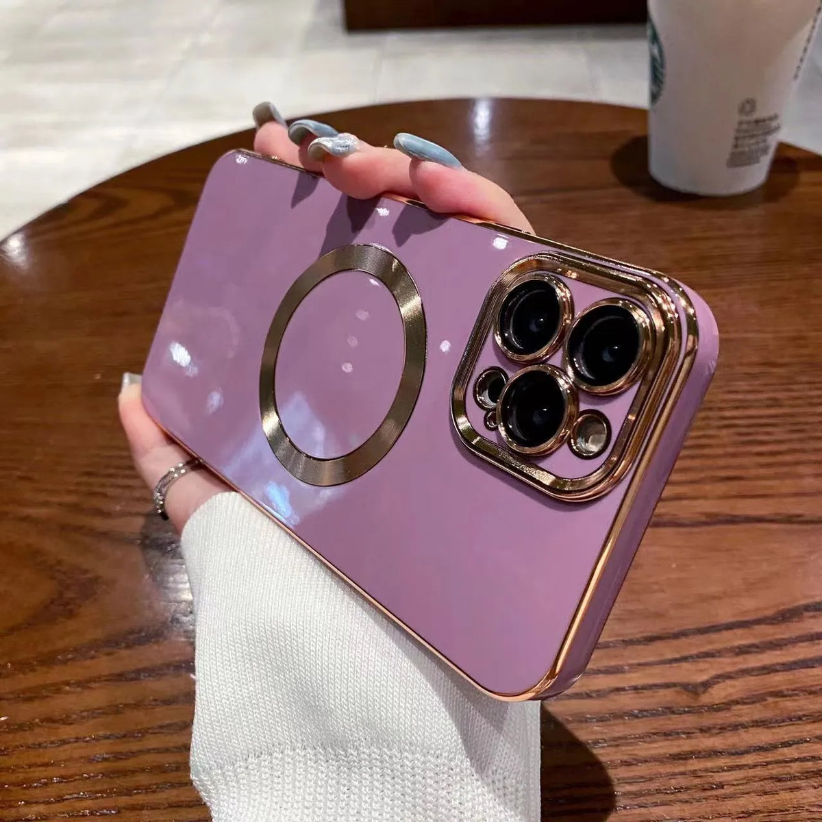 Magnetic phone case for iPhone 15 and 16 in cherry purple, made of electroplated TPU with brushed 6D finish.