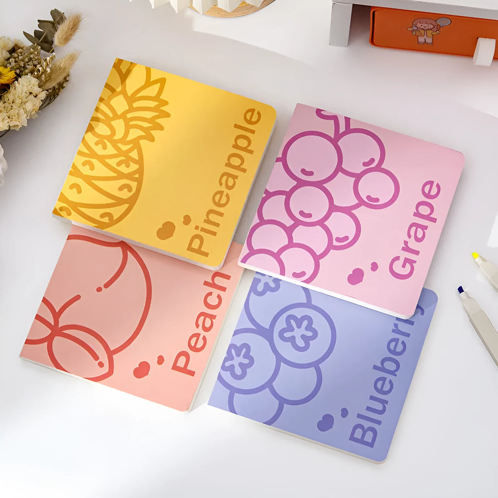 Square fruit-embossed notebook showing 14.5 cm dimensions and 80g thickened paper pages.