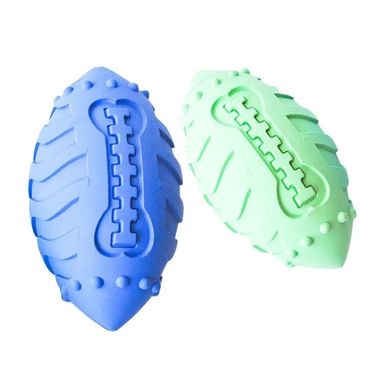 Sapphire blue rubber rugby ball dog toy with bite-resistant thickened construction.