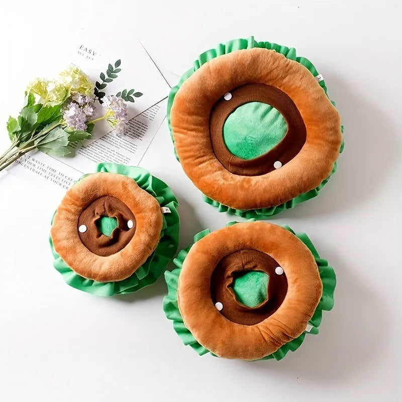 Soft fabric burger-shaped collar for cats on a neutral background, showing lettuce and cheese details.