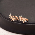 Rose gold circular earrings with waterdrop flower design and electroplated finish