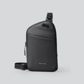 Men's lightweight black Oxford cloth crossbody bag with simple design and visible stitching.