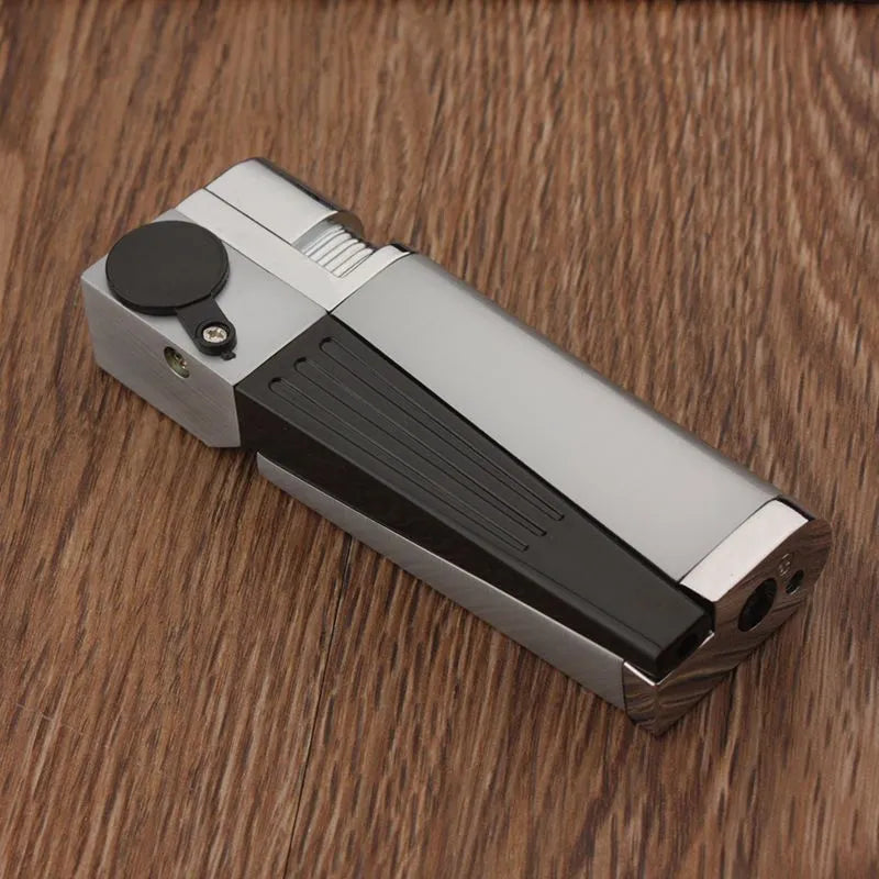 Silver foldable metal pipe lighter shown open, revealing lighter mechanism and small storage compartment.