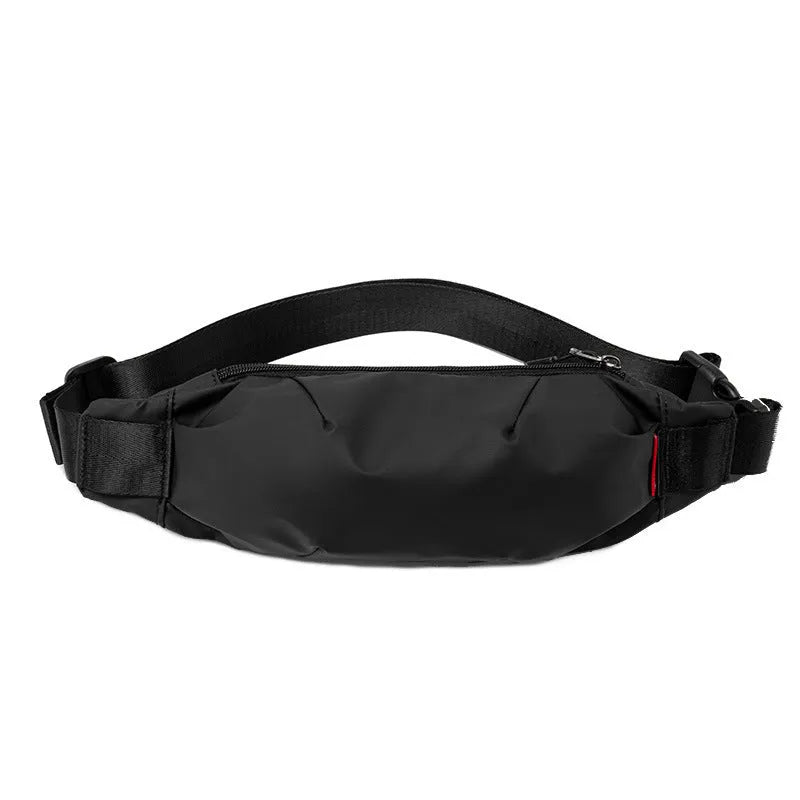 Men's black Oxford cloth crossbody waist pack showing interior organisation pockets