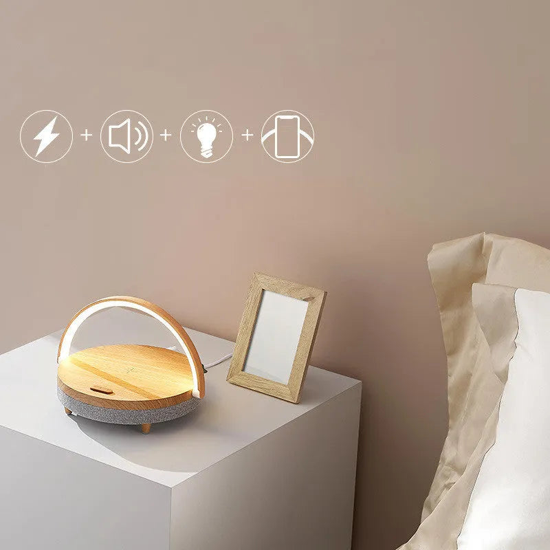 White wireless charging LED night light with Bluetooth speaker and phone holder in marble pattern finish