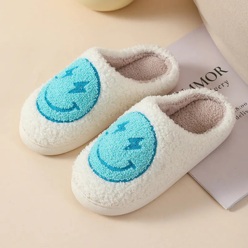 Adult women's plush cartoon-style home slippers with non-slip PVC soles in multiple colour options.