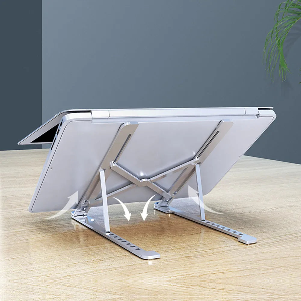 Portable aluminium laptop stand folded showing adjustable height mechanism