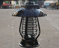 White solar-powered mosquito lamp with purple switch and LED lights for garden insect control