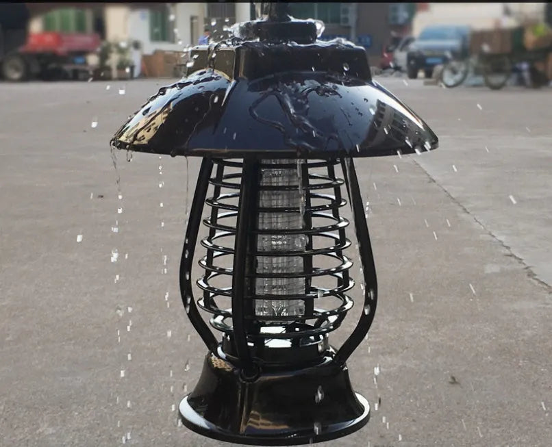 White solar-powered mosquito lamp with purple switch and LED lights for garden insect control