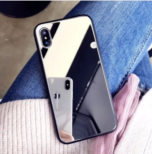 Black iPhone back cover case with a reflective mirror surface on the back, compatible with iPhone 7 Plus, 8 Plus, and X models.