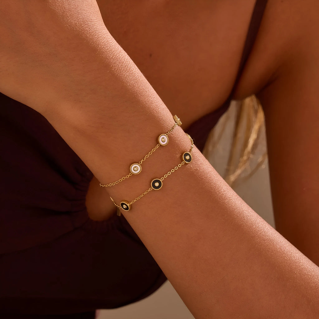 Women's stainless steel bracelet and necklace set with electroplated 18K gold finish in geometric design