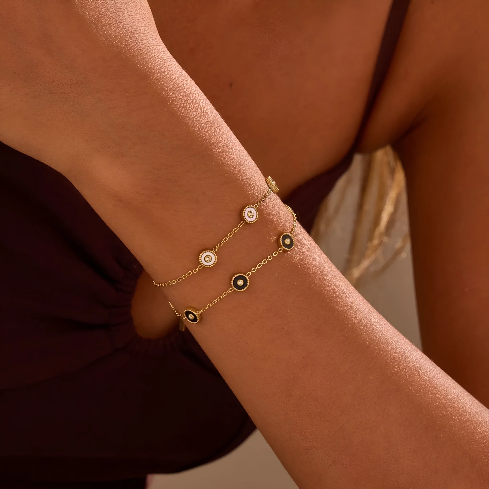 Women's stainless steel bracelet and necklace set with electroplated 18K gold finish in geometric design