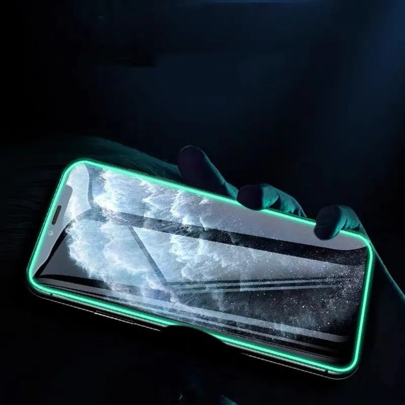 Luminous full cover tempered glass screen protector for iPhone showing glowing edge in dark.