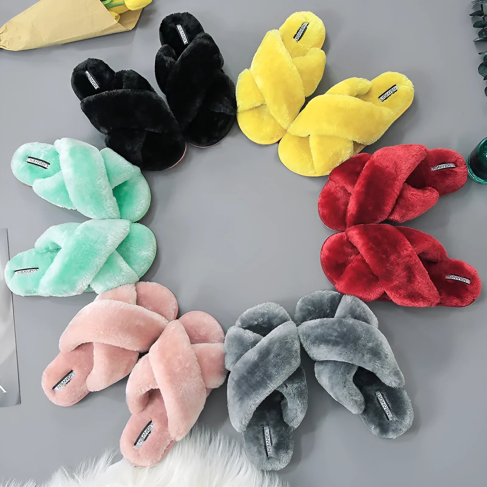 Cross open-toe fur slippers in multiple colours showing personalised toe design and non-slip patterned sole