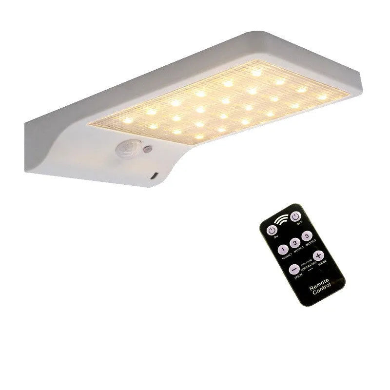 Black and white solar garden light with waterproof IP65 rating for outdoor balcony and courtyard use