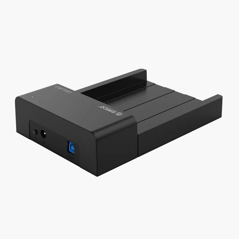 Black plastic 2.5 inch SATA hard disk enclosure with USB cable for portable external storage