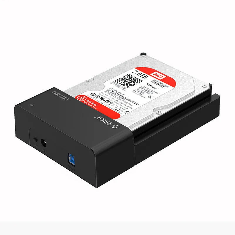 Black plastic 2.5 inch SATA hard disk enclosure with USB cable for portable external storage