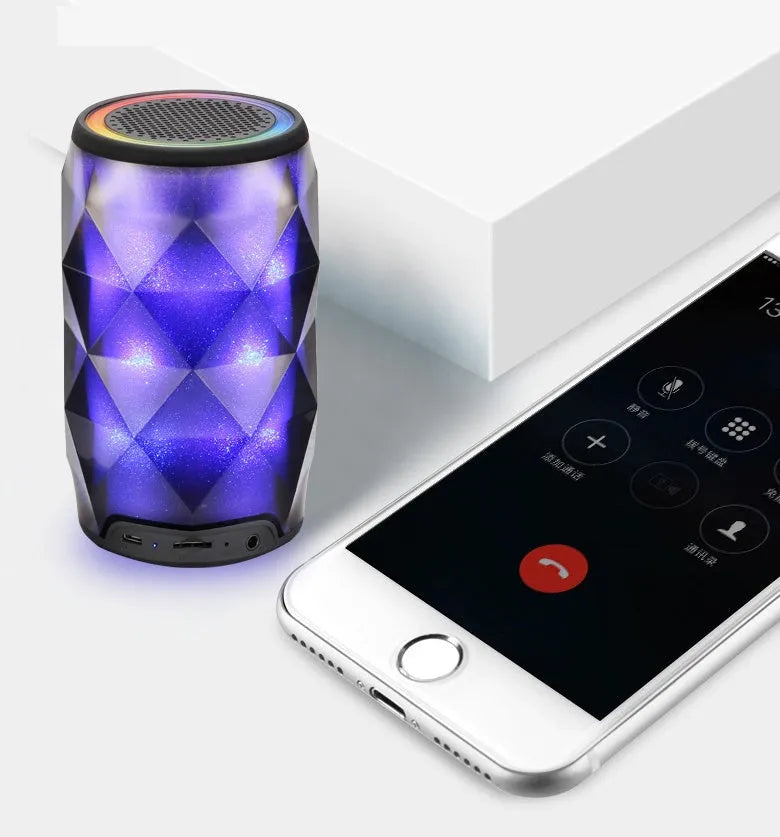 Black crystal diamond-cut Coke can shaped Bluetooth speaker with colourful LED starry sky lighting effect.