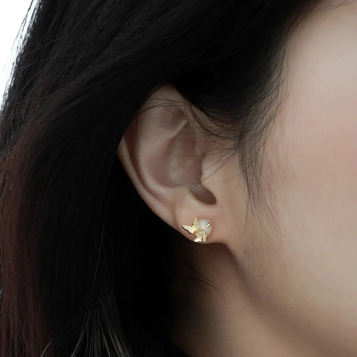Butterfly ear studs in 925 silver with electroplated gold or white gold colour finishes