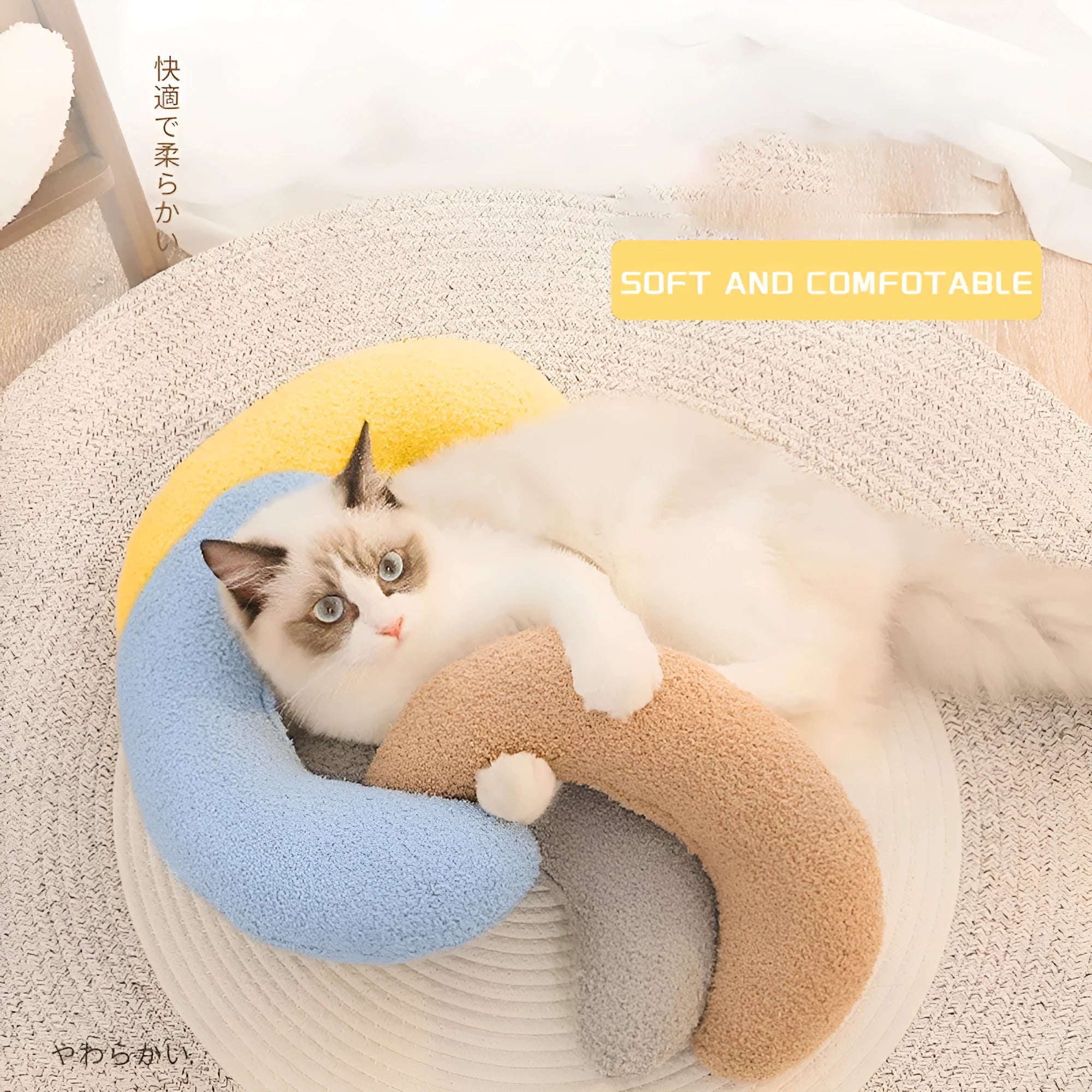 Blue U-shaped cat pillow with integrated adjustable collar for feline cervical support