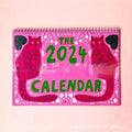 Cat-themed wall calendar planner for 2024 or 2025 on paper