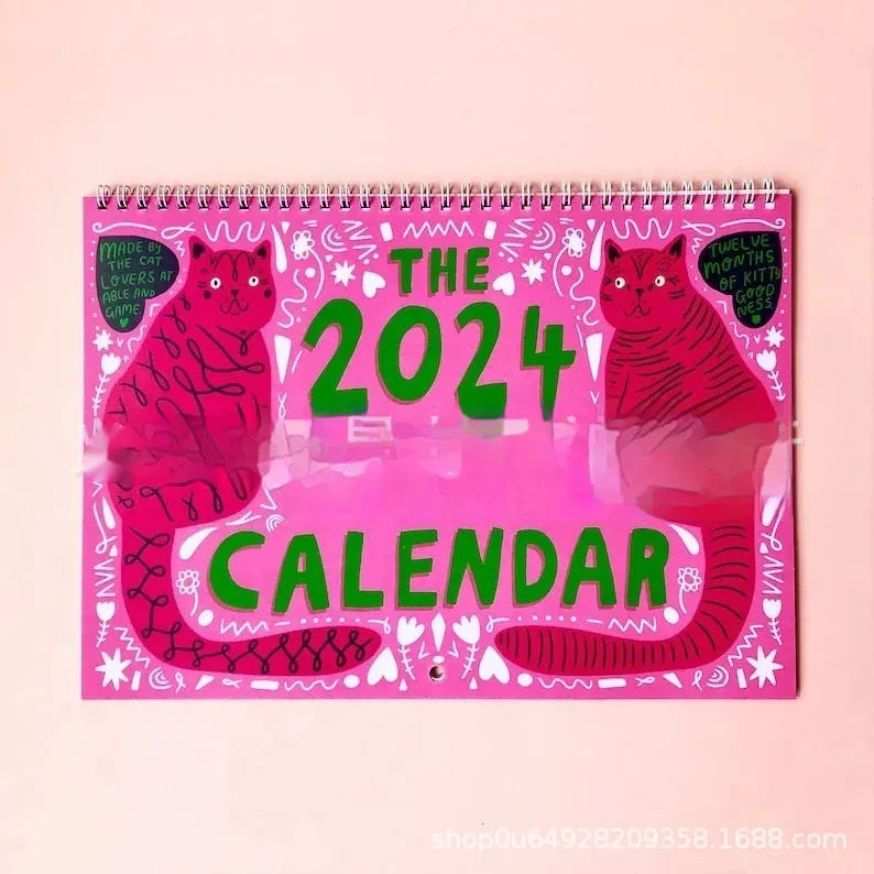 Cat-themed wall calendar planner for 2024 or 2025 on paper