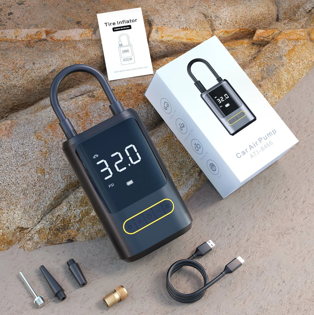 Wireless digital display car tyre inflator with LED light and multiple nozzles on black background