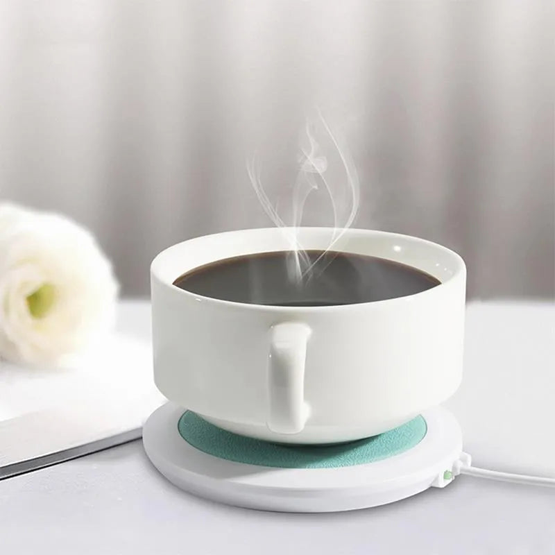 Black USB heating coaster for coffee mugs on office desk