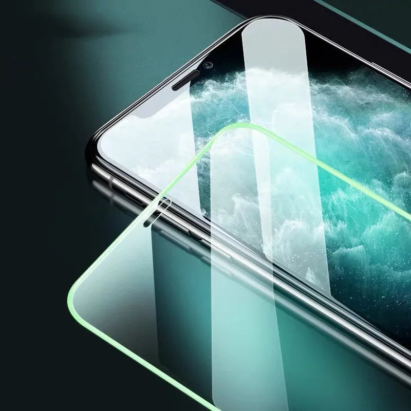 Luminous full cover tempered glass screen protector for iPhone showing glowing edge in dark.
