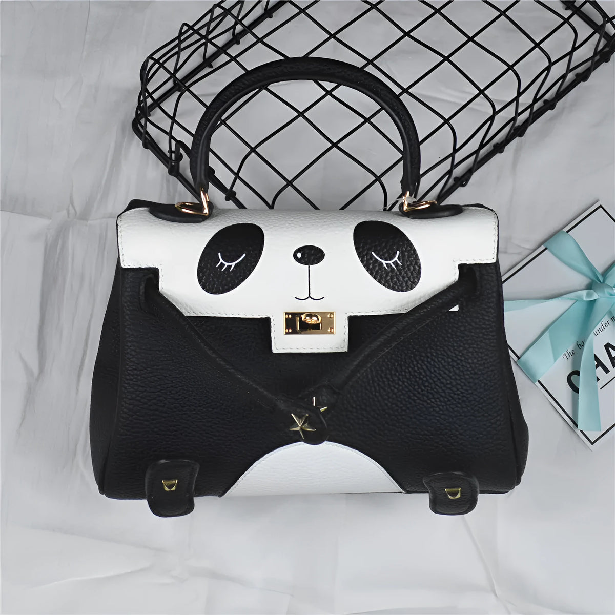 Panda print cowhide leather handbag in horizontal square shape showing two size options