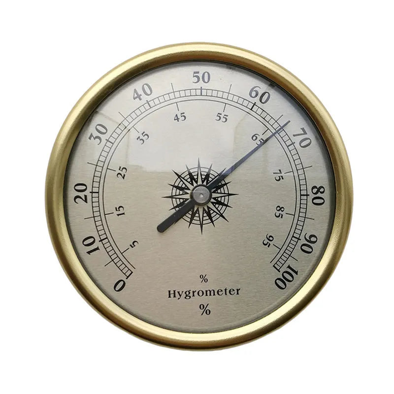 Silver analog hygrometer and thermometer with aluminium ring and dial showing temperature and humidity scales