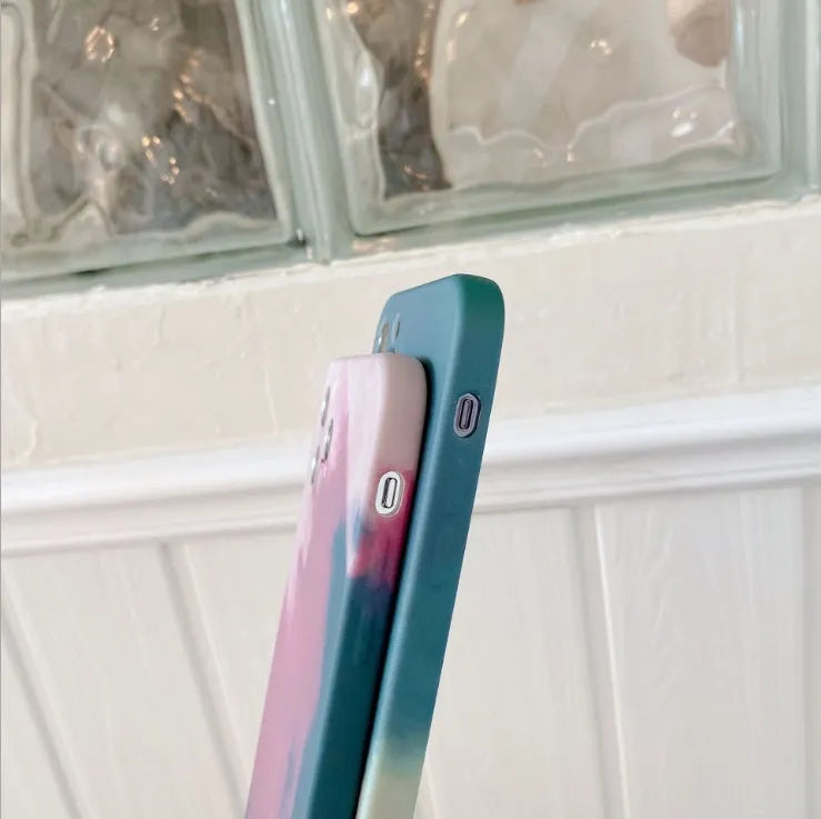 Soft silicone iPhone case with blue and purple gradient geometric abstract artwork.
