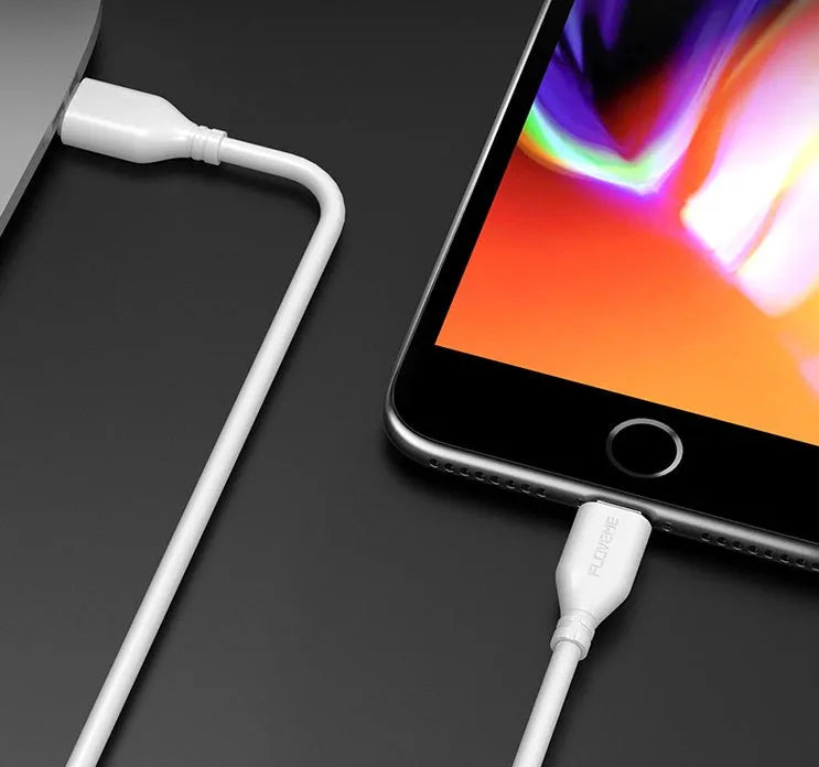 White braided USB-C to Lightning charging cable, 1.8 metres long, coiled on a surface.