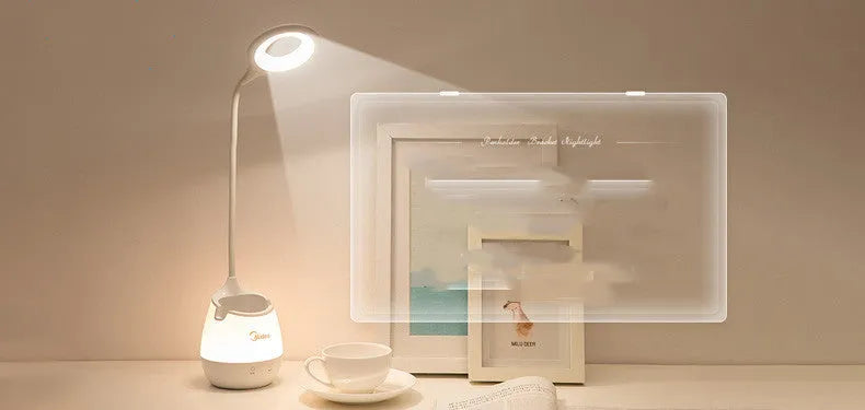 Green USB rechargeable touch control LED table lamp on a wooden desk.