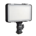 Shenniu M150 ultra-thin silver LED video light panel with mounting bracket on a table.
