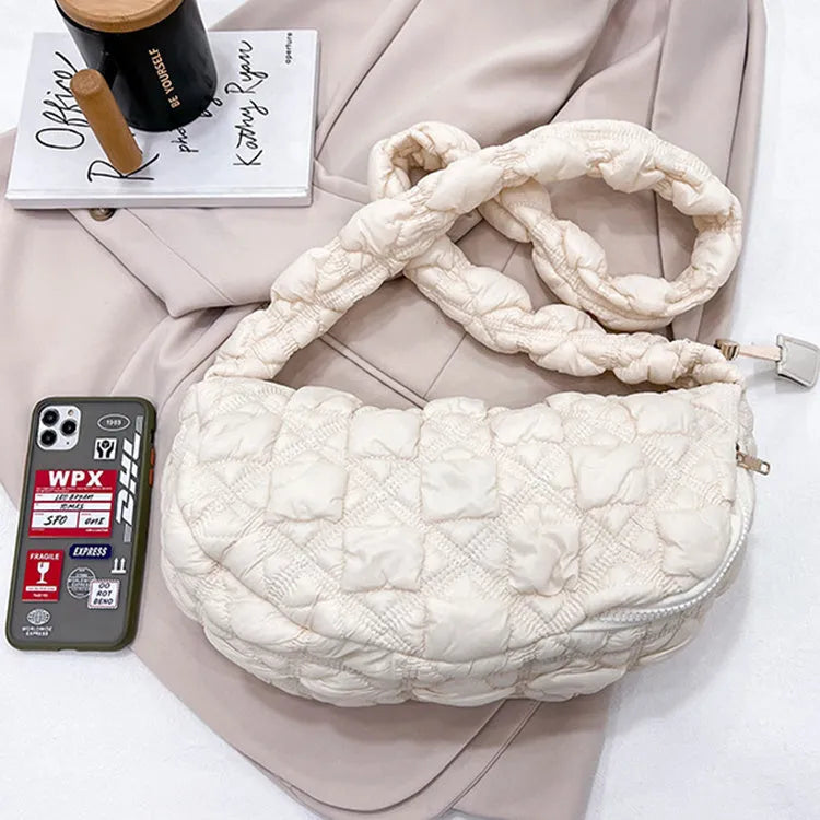 Women's light beige nylon messenger bag with long shoulder strap, shown with dimensions 35cm wide by 20cm high.